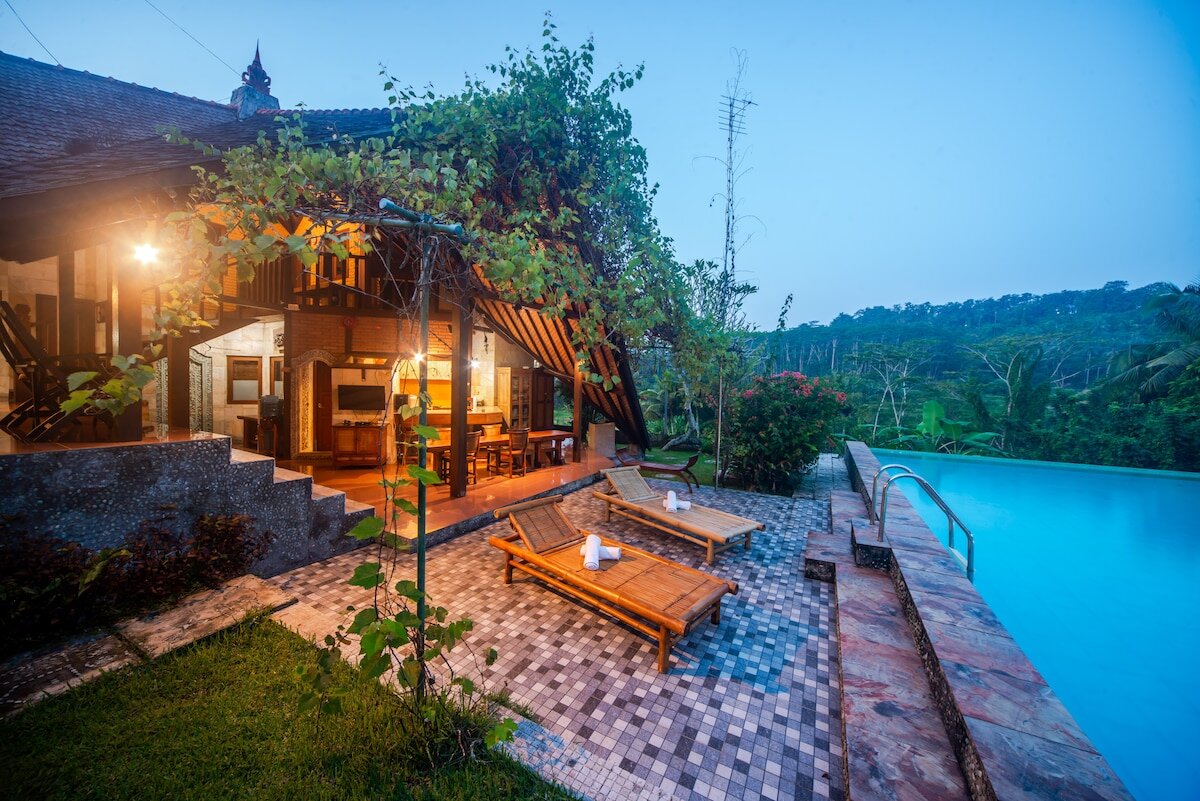 Villa Dandan Bukit at dusk, with infinity pool